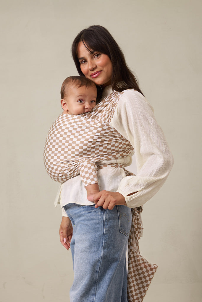 Solly Baby wrap in soft woven pattern — lightweight modal newborn carrier in contemporary color