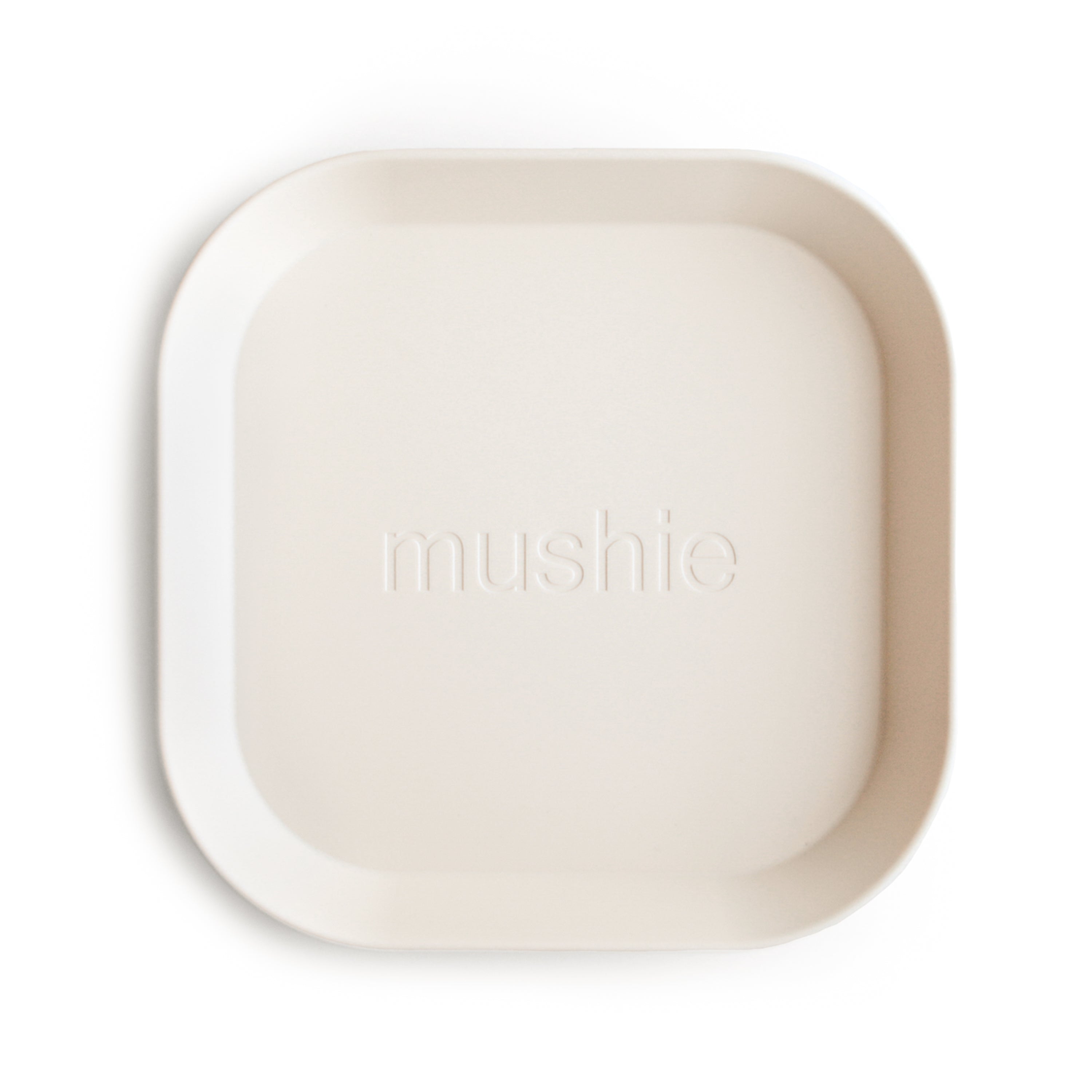 Mushie square silicone dinnerware plates in muted contemporary colors — minimal Scandinavian-style baby tableware