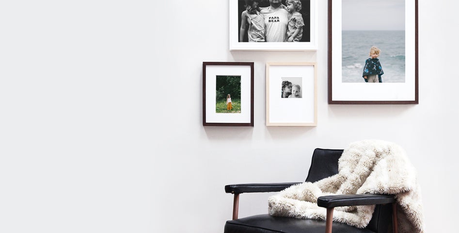Artifact Uprising custom framed photo prints displayed on wall