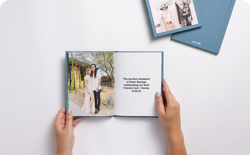 Chatbooks photo book collection on warm home surface