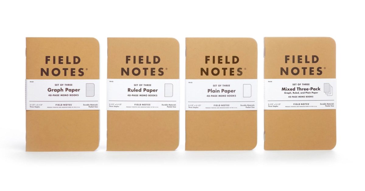Field Notes Original Kraft notebooks 3-pack fanned out on wooden surface