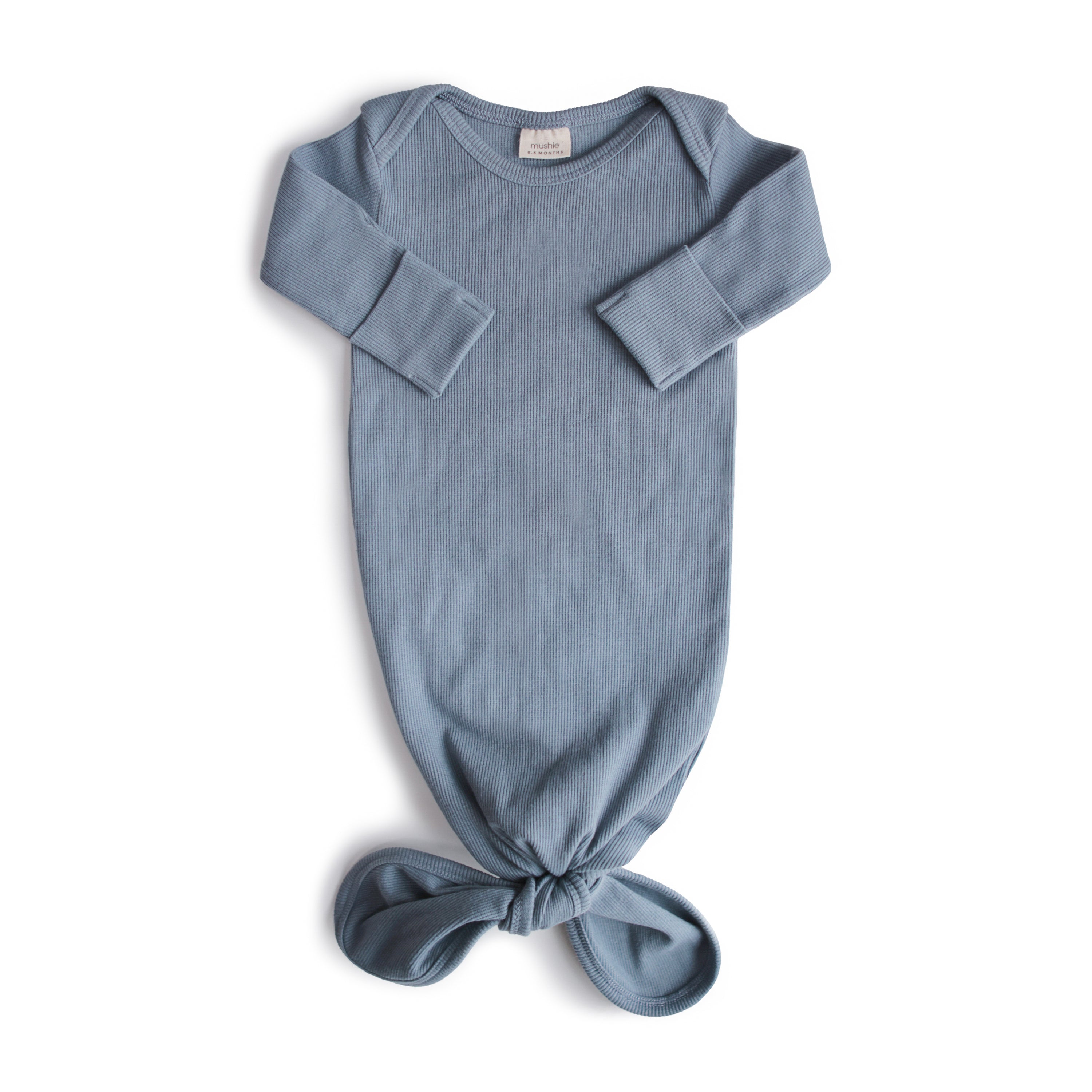 Mushie ribbed knotted baby gown in Tradewinds blue-grey color — a neutral, minimal baby clothing gift